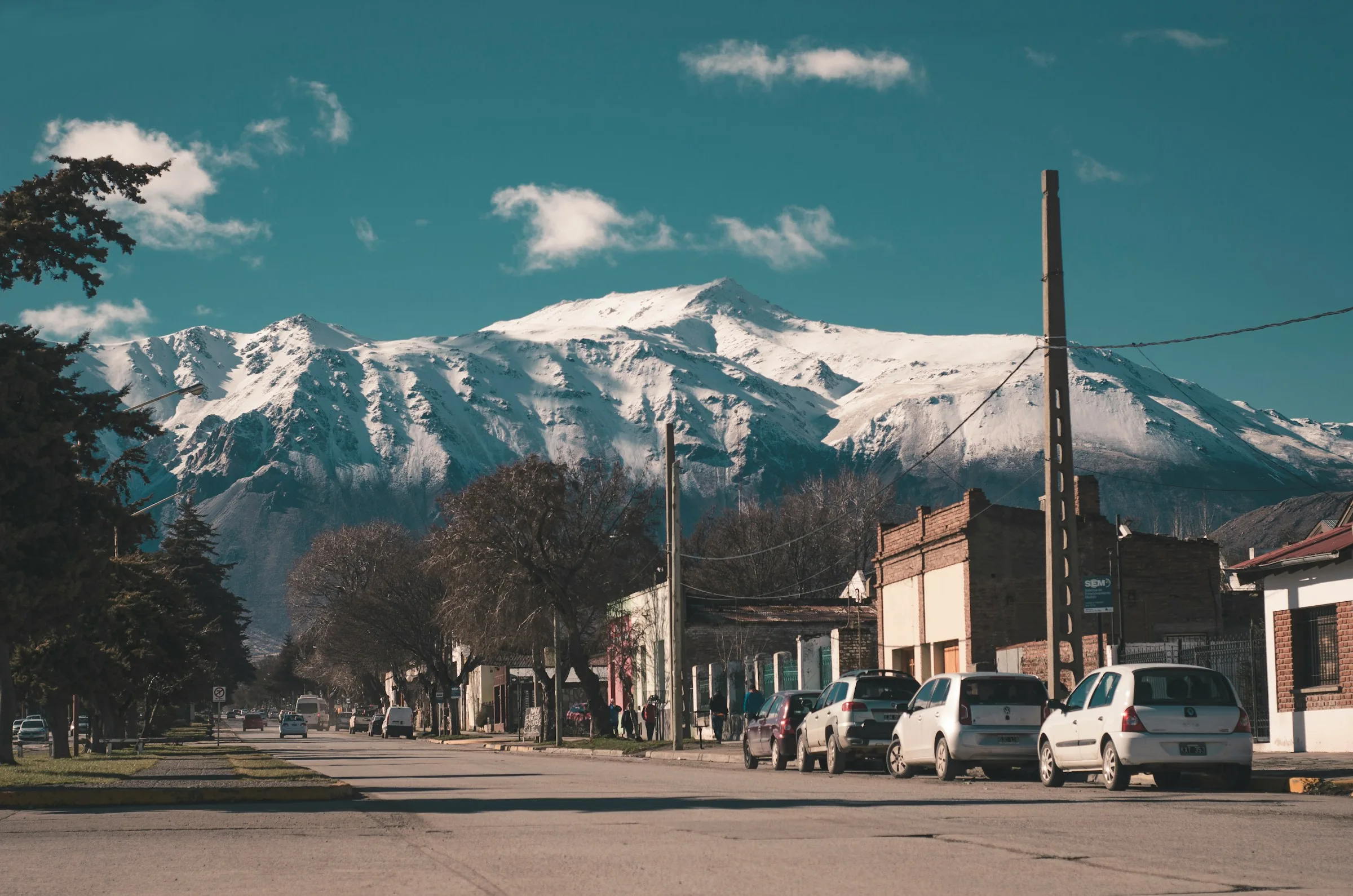 A small town in Chubut province, Argentina, with the snow-capped Andes in the background